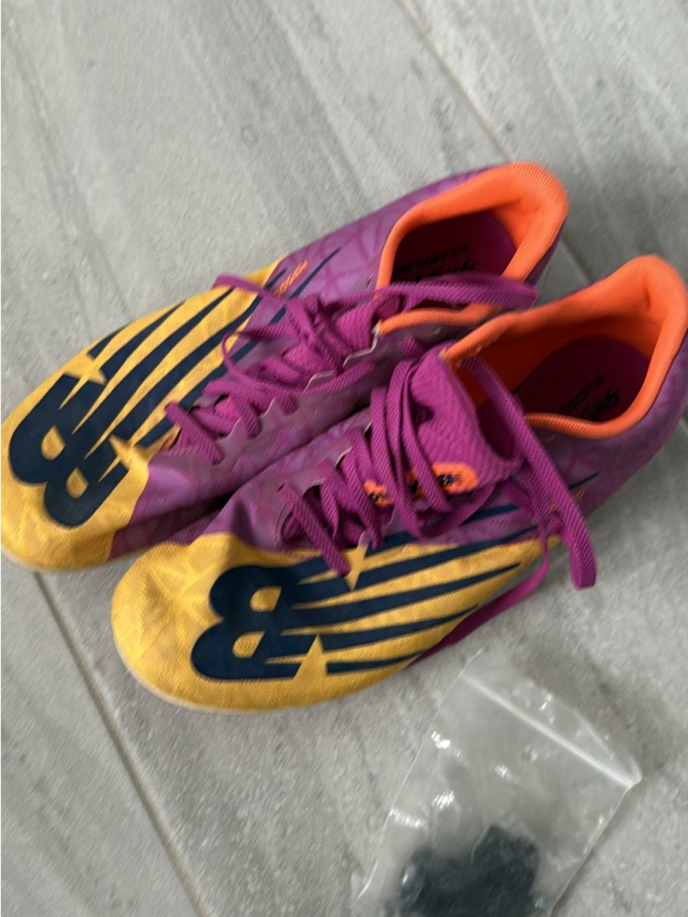 New Balance Men’s Purple & Orange Track Spikes with Yellow Toecaps